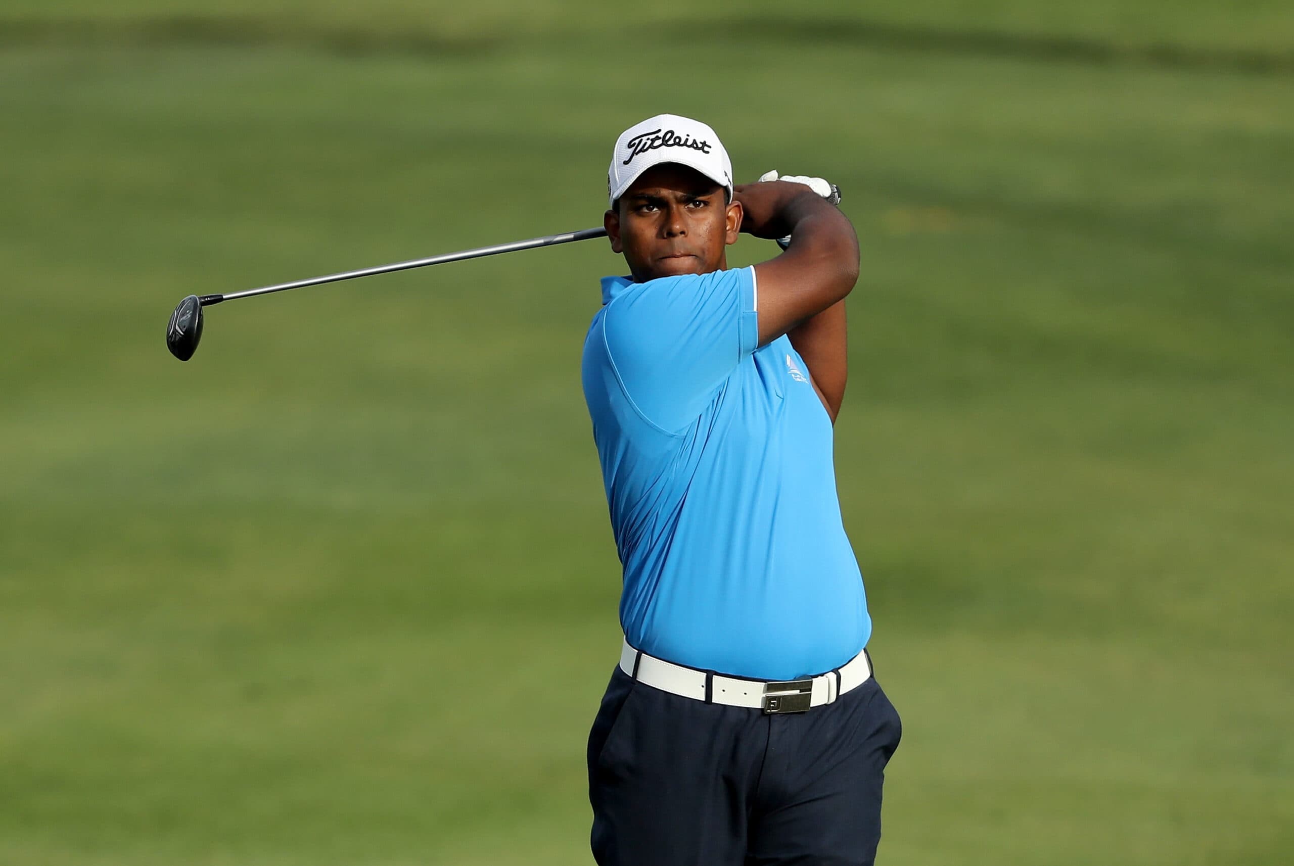 DUBAI, UNITED ARAB EMIRATES - FEBRUARY 02:  Rayhan Thomas of India plays his second shot on the par 5, 10th hole during the first round of the 2017 Omega Dubai Desert Classic on the Majlis Course at the Emirates Golf Club at Emirates Golf Club on February 2, 2017 in Dubai, United Arab Emirates.  (Photo by David Cannon/Getty Images) *** Local Caption *** Rayhan Thomas