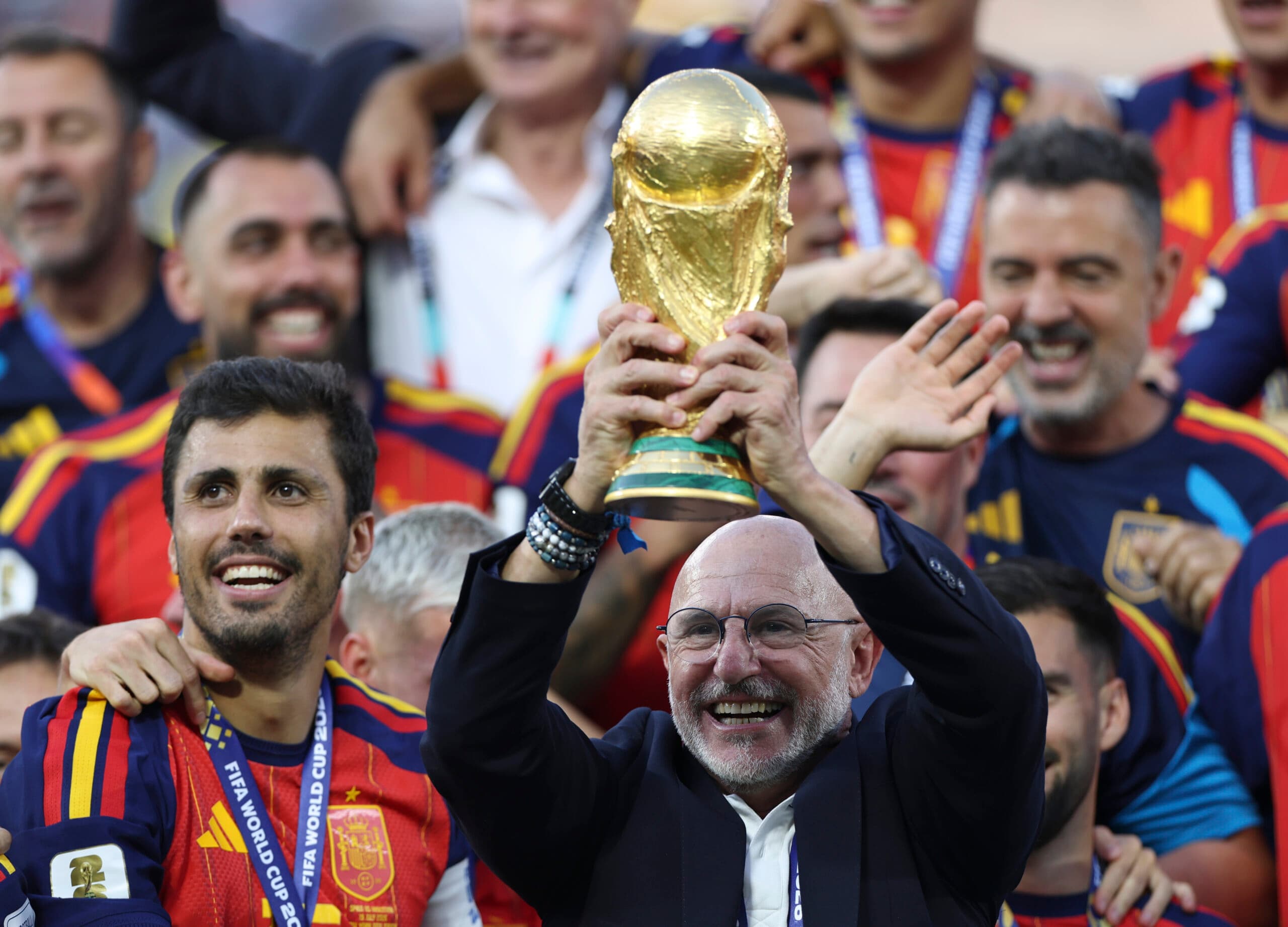 New Jersey: Luis de la Fuente (R), head coach of Spain, holds the trophy during the awarding ceremony after the final match between Spain and Argentina at the 2026 FIFA World Cup at the New York New Jersey Stadium, the United States, July 19, 2026. (Photo: Xinhua via IANS)
