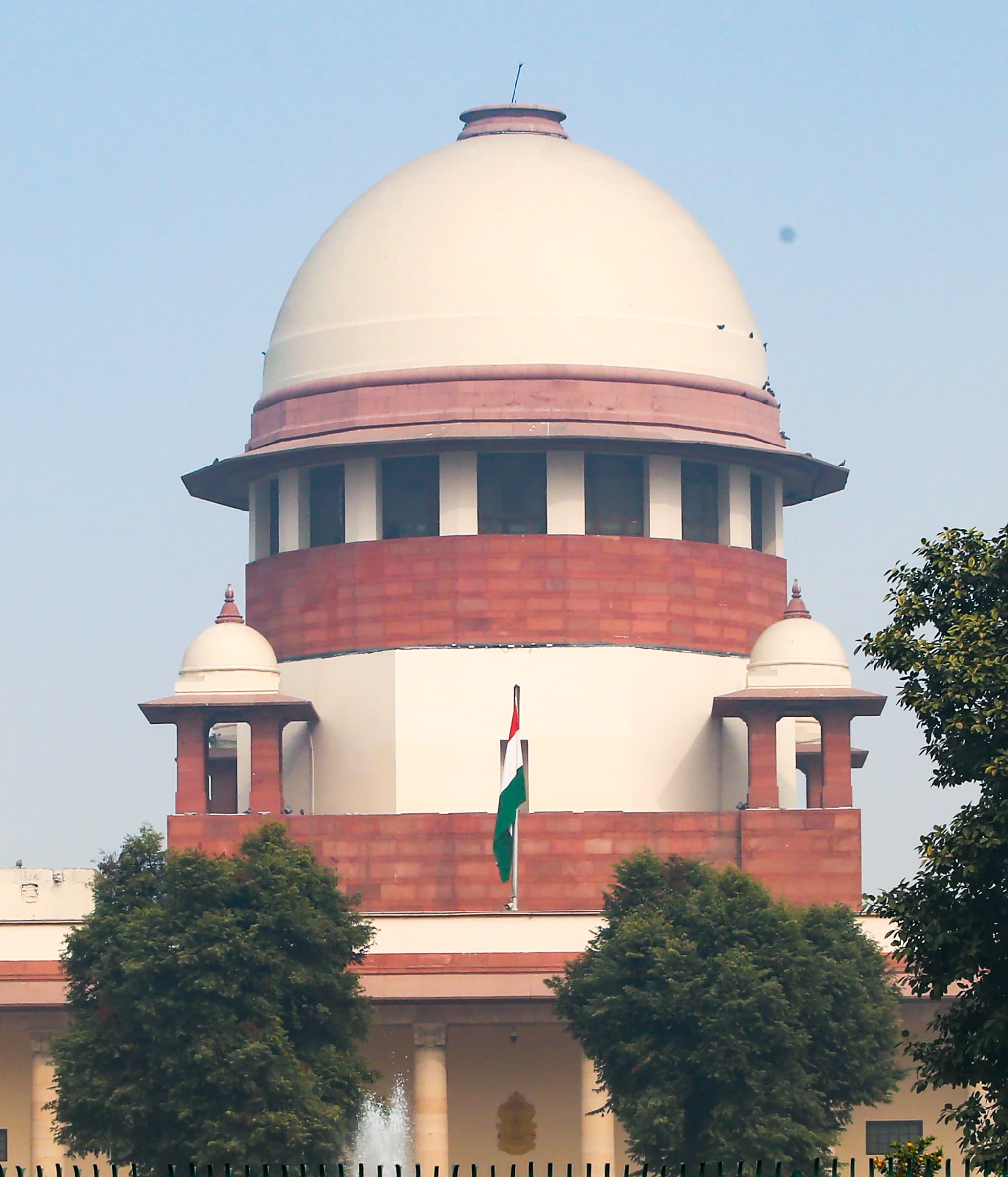 New Delhi: A striking view of the Supreme Court of India standing tall under a clear sky, in New Delhi, Monday, December 29, 2025. (Photo: IANS/Prem Nath Pandey)
