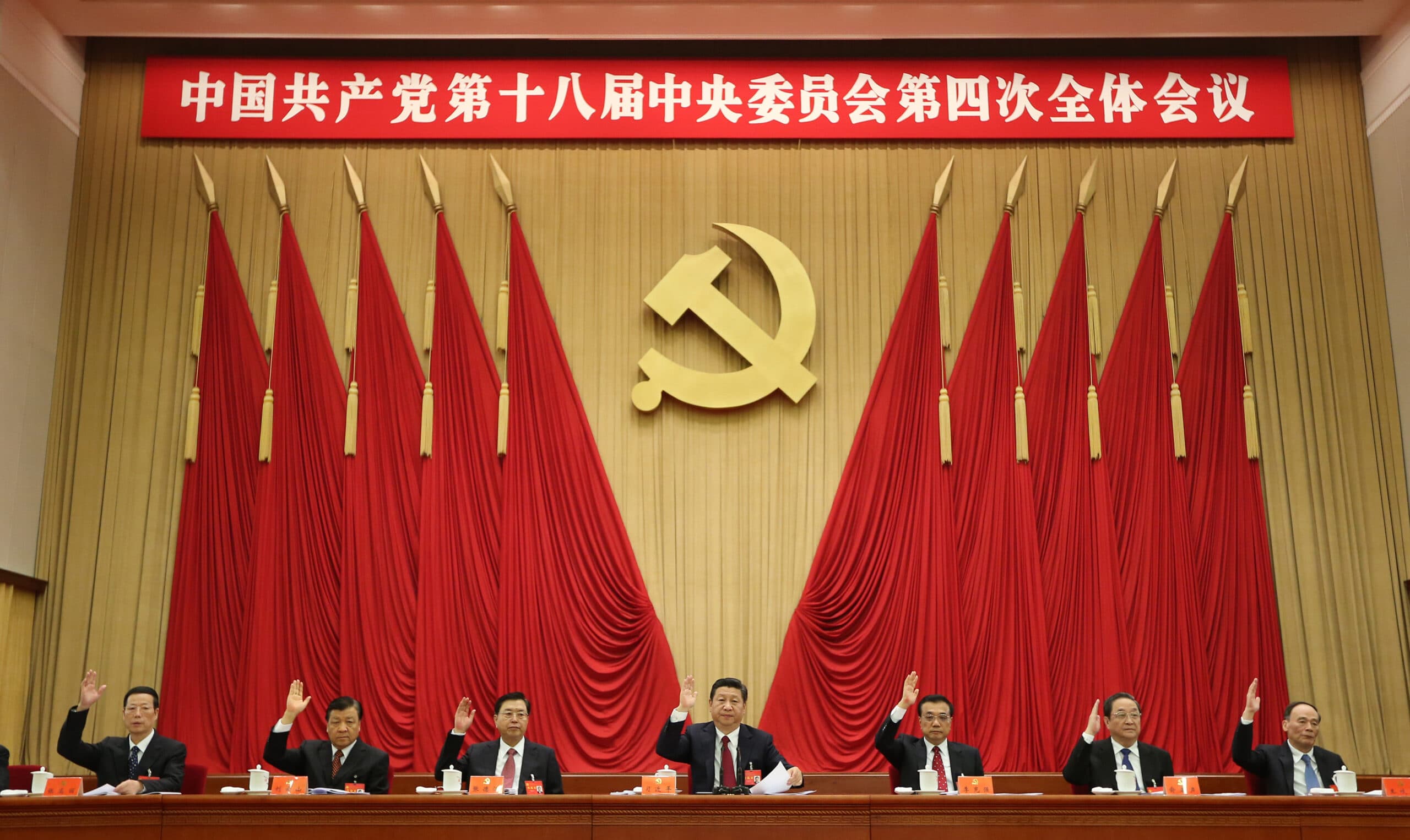 (141023) -- BEIJING, Oct. 23, 2014 (Xinhua) -- Chinese leaders Xi Jinping, Li Keqiang, Zhang Dejiang, Yu Zhengsheng, Liu Yunshan, Wang Qishan and Zhang Gaoli attend the Fourth Plenary Session of the 18th Central Committee of the Communist Party of China (CPC) in Beijing, capital of China. The session was held here from Oct. 20 to 23.  (Xinhua/Lan Hongguang) (yxb)