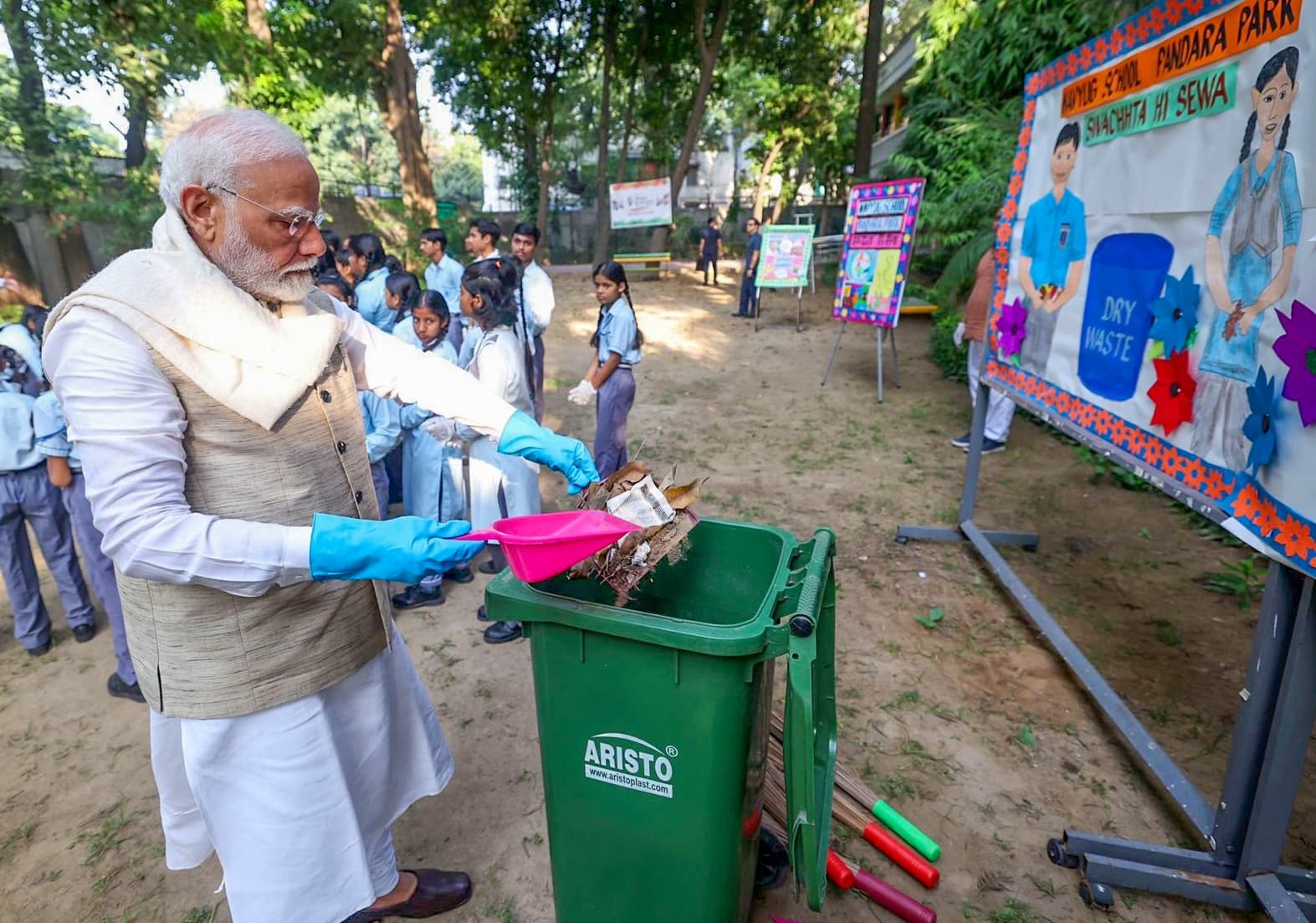 New Delhi: Prime Minister Narendra Modi participates in a cleanliness drive under the 'Swachh Bharat Mission' campaign at a school on the occasion of Gandhi Jayanti in New Delhi on Wednesday, October 02, 2024. (Photo: IANS)