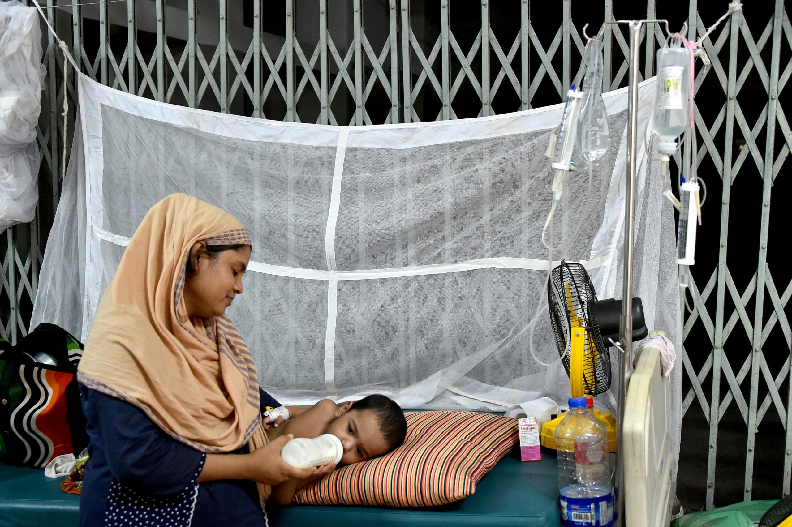 DHAKA, Aug. 6, 2019 (Xinhua) -- A mother feeds her baby infected with dengue at a hospital in Dhaka, Bangladesh, on Aug. 6, 2019. The Bangladeshi government has confirmed another five deaths from dengue fever, bringing the total number of fatalities in the country since January to 23, the Directorate General of Health Services reported Tuesday. (Str/Xinhua/IANS)