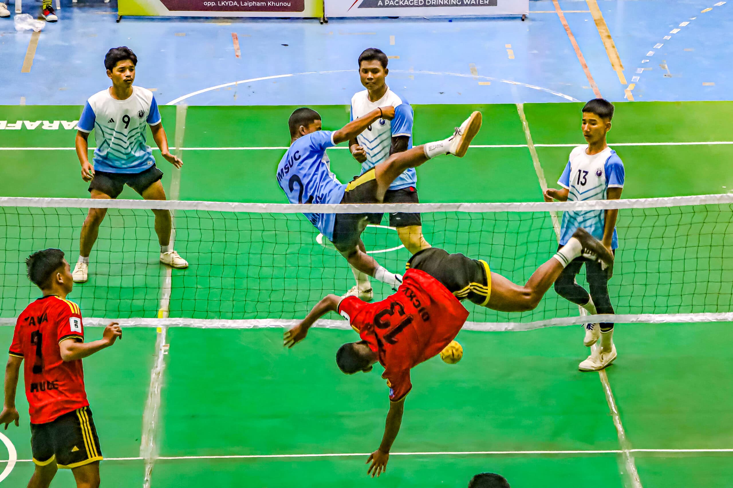 Imphal: Players in action during the Senior Men's and Senior Women's competitions on Day 4 of the 25th Mini Boys &amp; Girls, 27th Sub-Junior Boys &amp; Girls, 27th Junior Boys &amp; Girls, and 40th Men's &amp; Women's State Sepaktakraw Championship 2026 at Khuman Lampak Indoor Stadium, in Imphal on Sunday, June 28, 2026. (Photo: IANS)