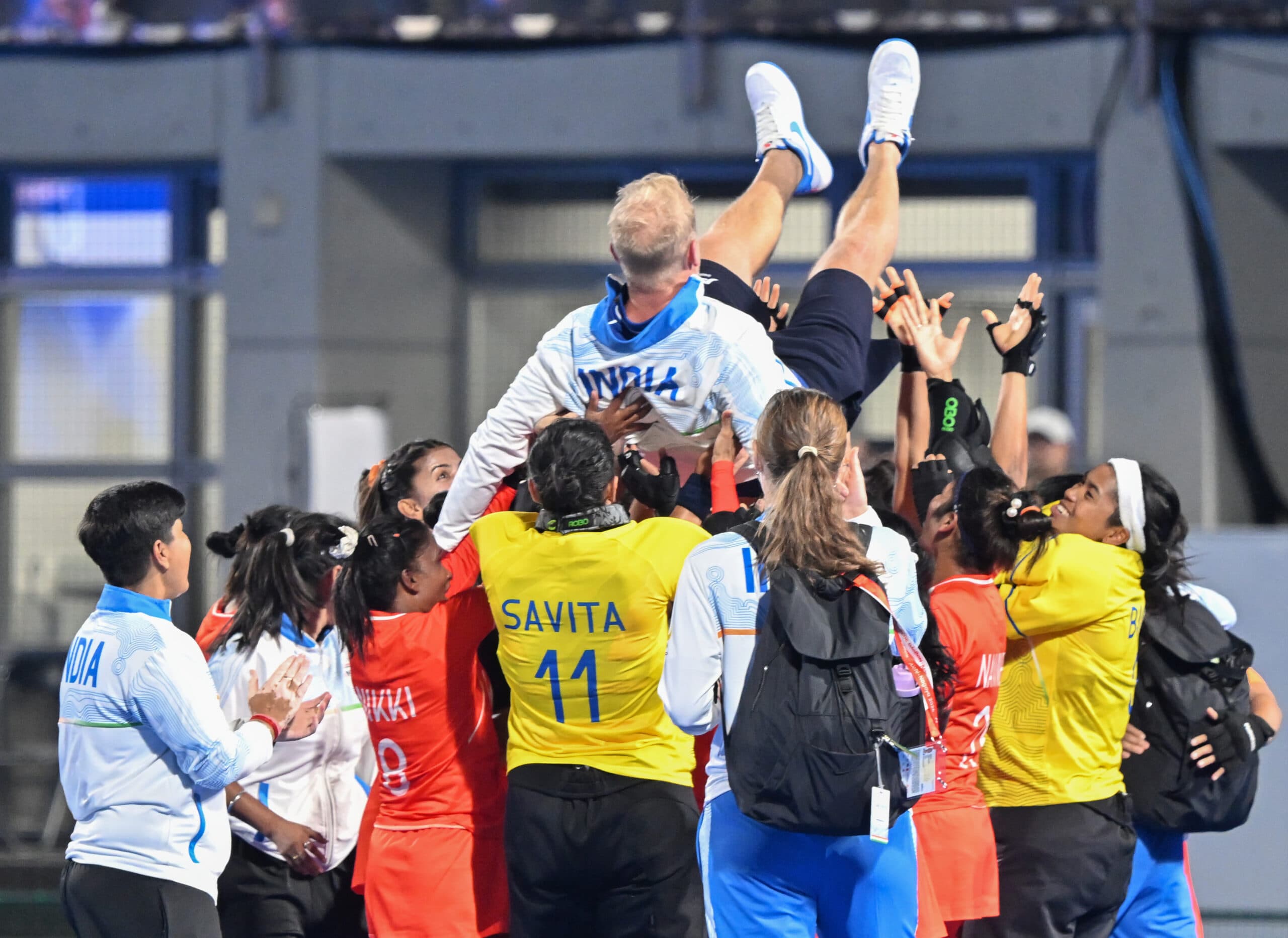 Kakamigahara: Team India players celebrate with their coach Sjoerd Marijne after their victory over Team China in the women's hockey gold medal match at the Asian Games, in Gifu, Japan on Friday, October 2, 2026. (Photo: IANS/Biplab Banerjee)