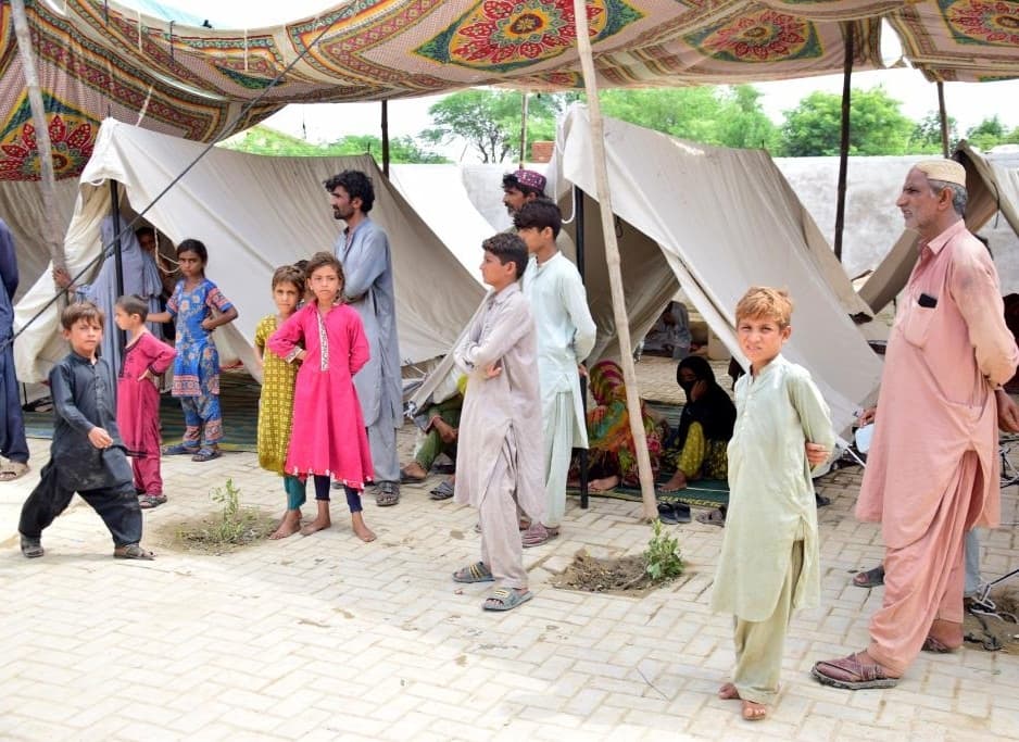 Flood-affected people are seen in flood-hit Jafarabad district in Pakistan's southwest Balochistan province on Sept. 3, 2022.(Photo by Asad/Xinhua/IANS)