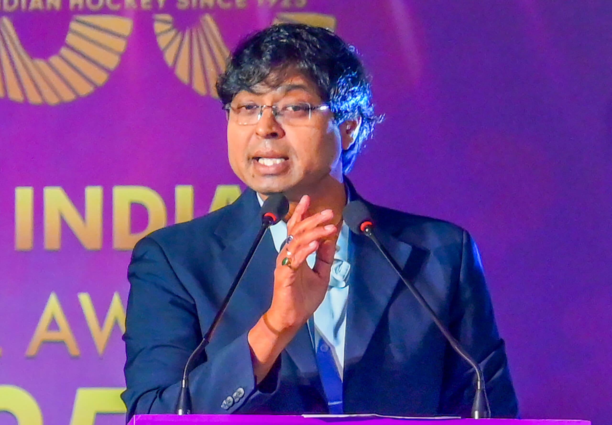 New Delhi: Hockey India President Dr. Dilip Kumar Tirkey addresses during the Hockey India 8th Annual Awards 2025, in New Delhi on Friday, March 27, 2026. (Photo: IANS/X/@TheHockeyIndia)