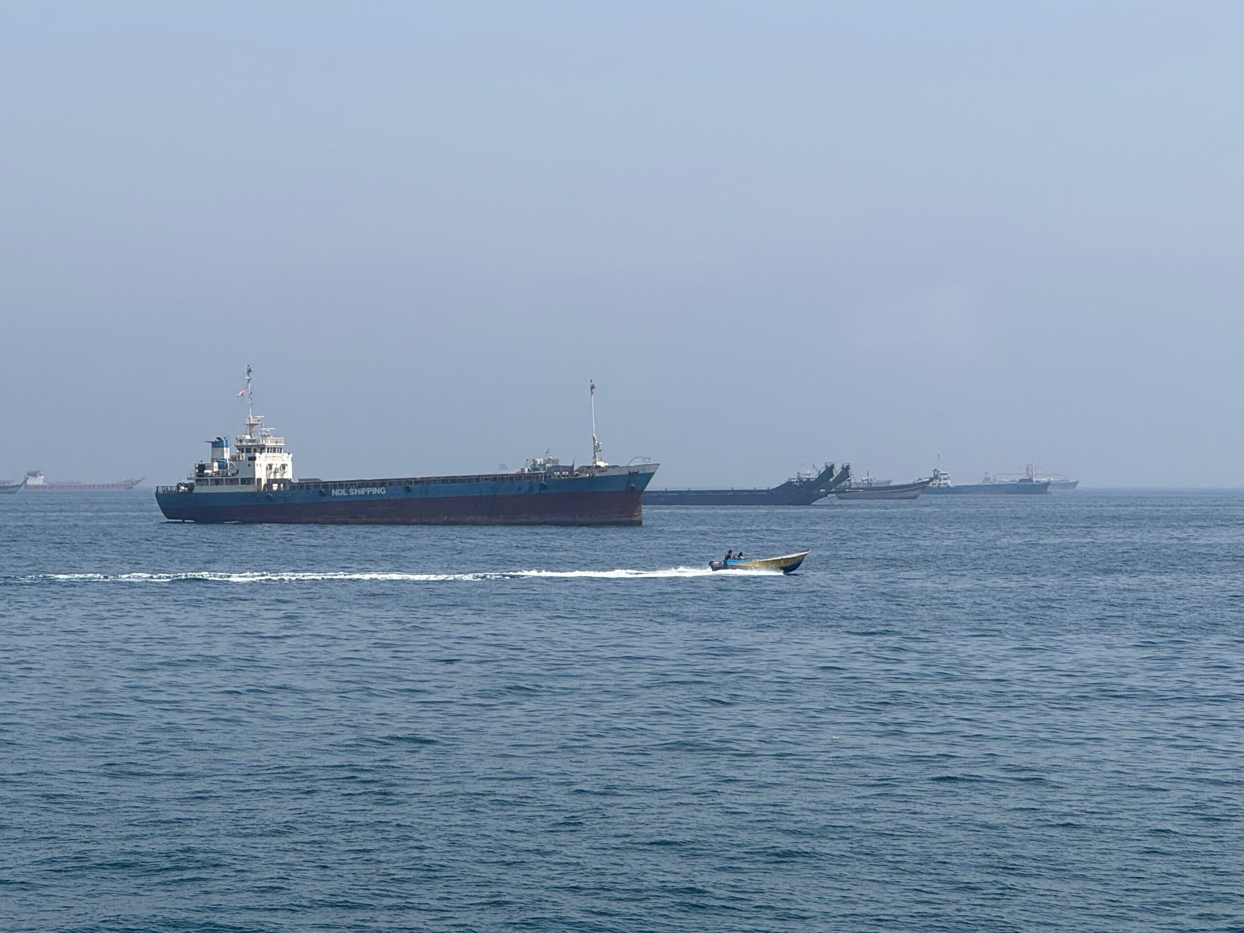 Khasab: This photo taken with a mobile phone shows merchant vessels stranded in the waters of the Strait of Hormuz, near Khasab, a small town in northern Oman, May 29, 2026. (Photo: Xinhua via IANS)