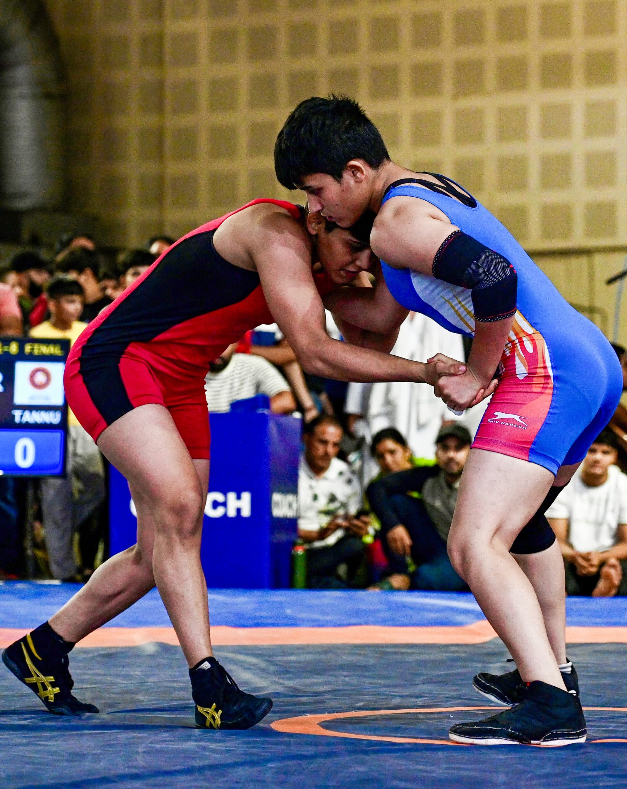 New Delhi: Wrestler Antim Panghal (in red) competes against Tannu in the women's 53kg category wrestling bout during the Asian Games selection trials at the Indira Gandhi Indoor Stadium in New Delhi on Saturday, May 30, 2026. (Photo: IANS/Deepak Kumar)
