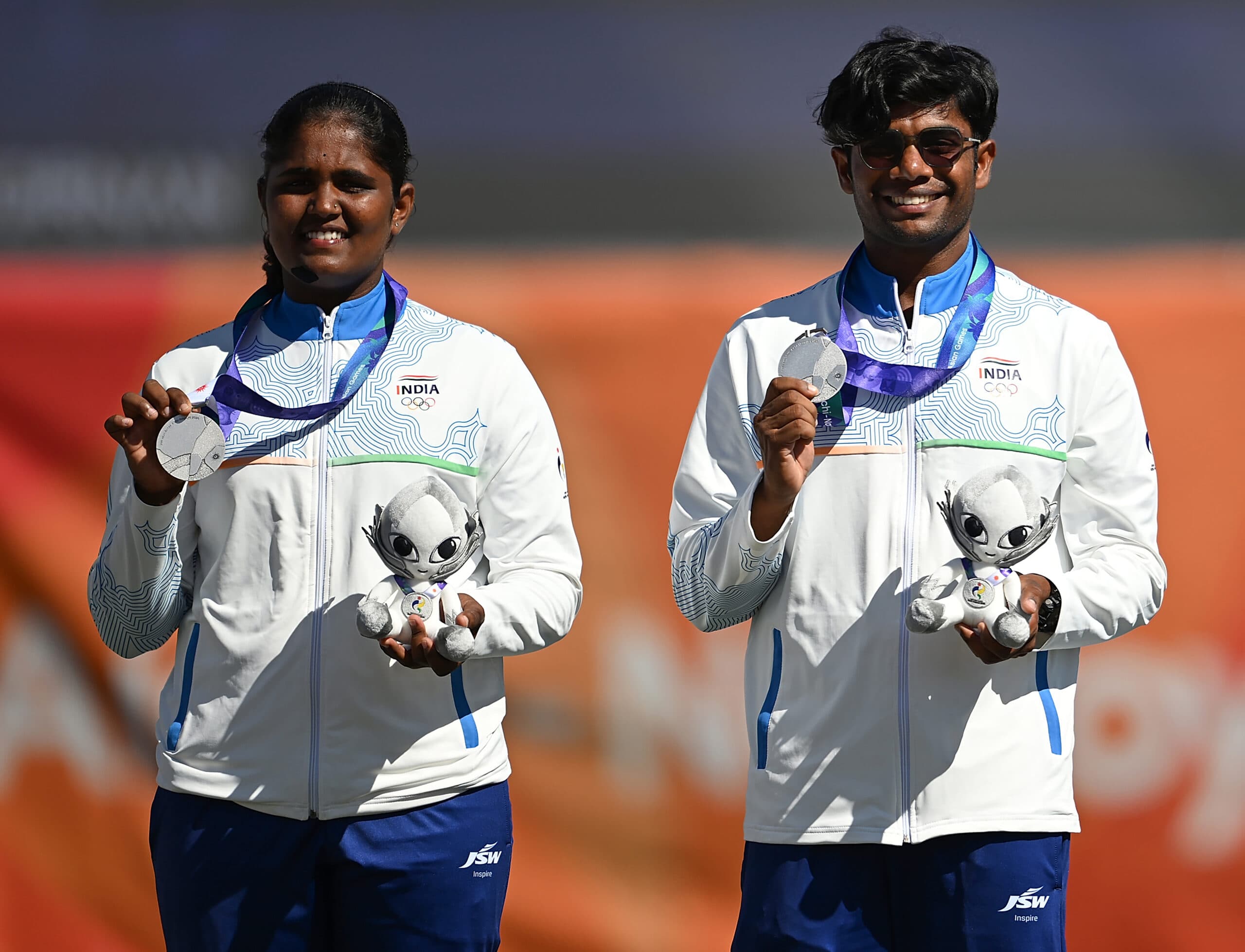 Okazaki: Silver medalists Kumkum Anil Mohod (L) and Dhiraj Bommadevara of team India pose for photos during the victory ceremony for the recurve mixed team of archery at the 20th Asian Games Aichi-Nagoya 2026 in Okazaki of Aichi Prefecture, Japan, Oct. 2, 2026. (Xinhua via IANS)
