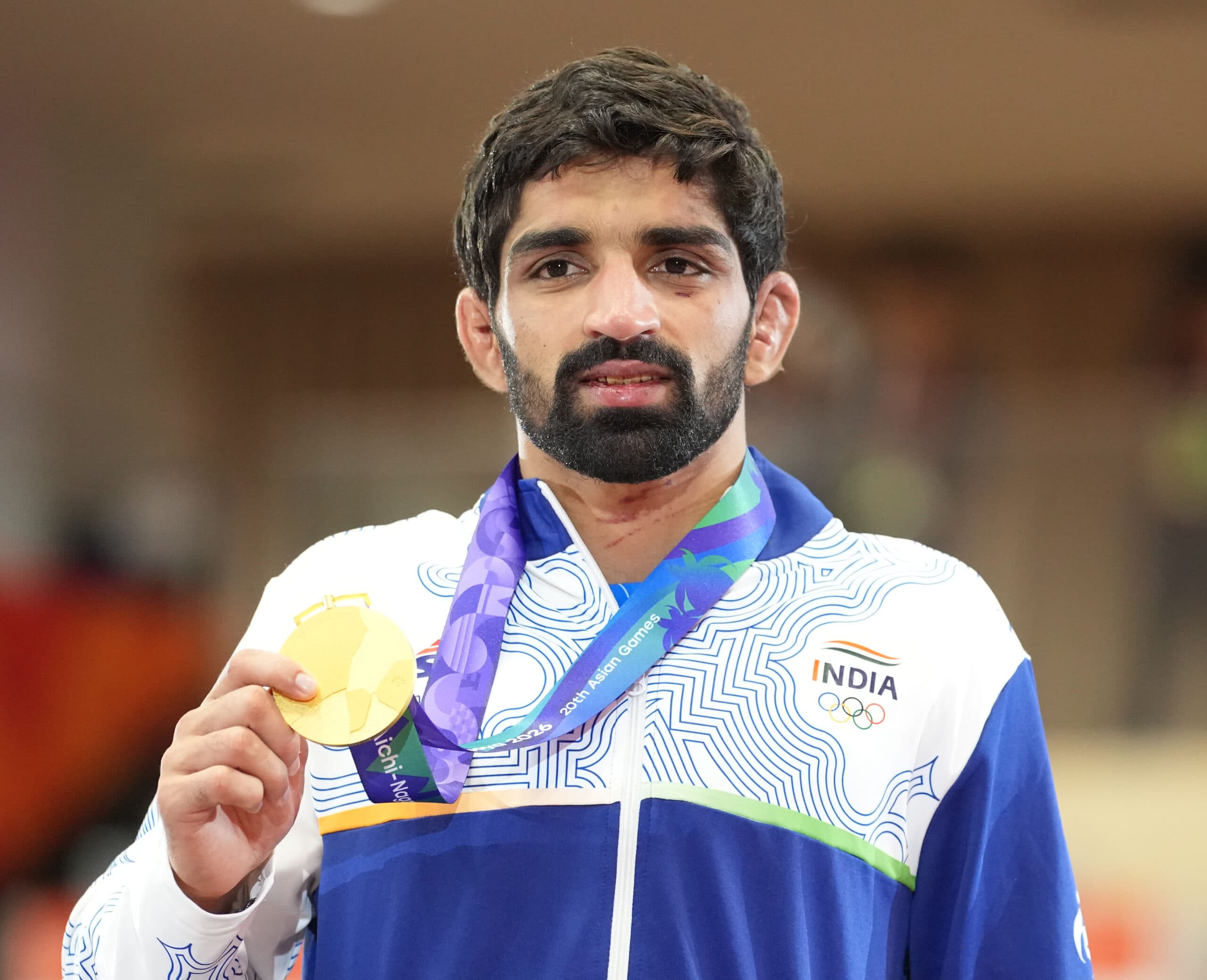 Nagoya: India's Aman Sehrawat poses with the gold medal after winning the men's freestyle 57kg wrestling final at the Asian Games 2026 in Nagoya, Japan, on Saturday, October 3, 2026. (Photo: IANS/Biplab Banerjee)