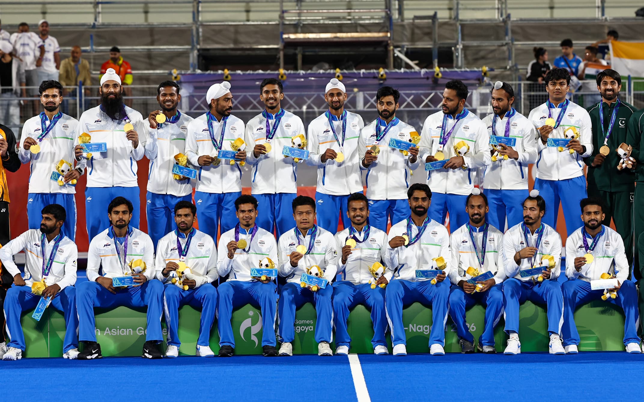 Kakamigahara: Team India pose with the gold medal after winning the men's hockey final against Malaysia at Gifu Prefectural Green Stadium in Kakamigahara, Japan, on Saturday, October 3, 2026. (Photo: IANS)
